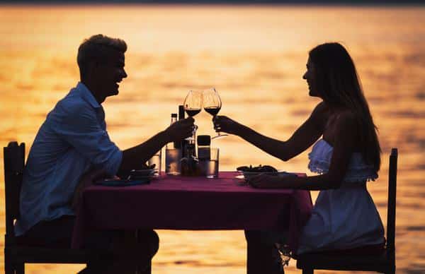 couple dinner beach front couple dinner beach front